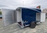 Remorque Fourgon Debon Cargo 1300 Bleue avec Suspension Pullman et Porte Latérale
